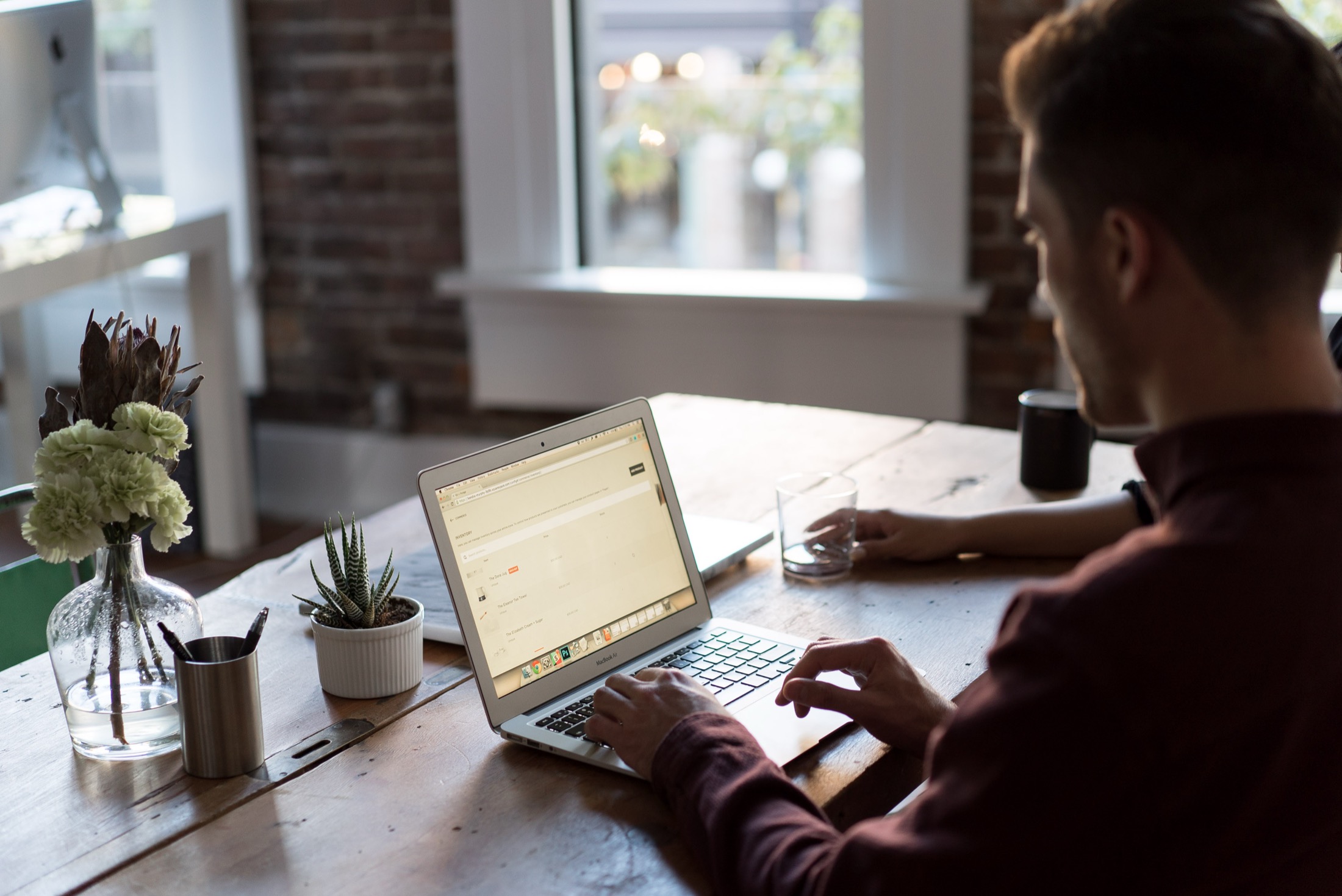 Laptop workspace used for business technology planning.